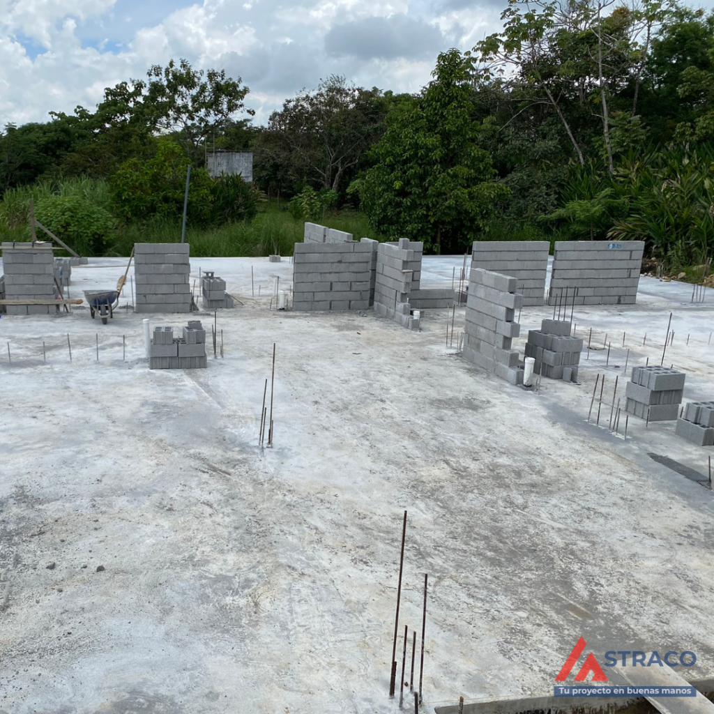 Concrete block walls being built on slab foundation in residential house construction in Boquete, Panama
