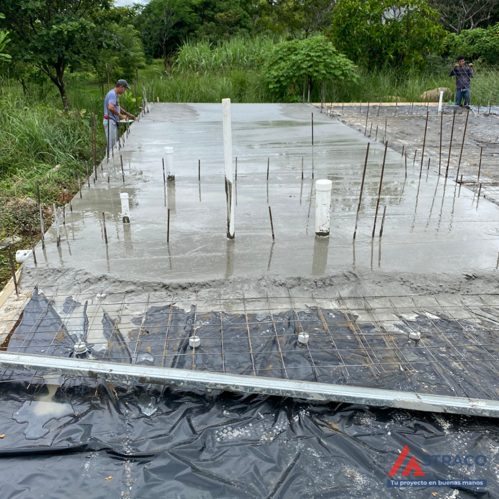 Concrete pouring for floor slab with reinforcement in house construction project in Alto Boquete, Panama